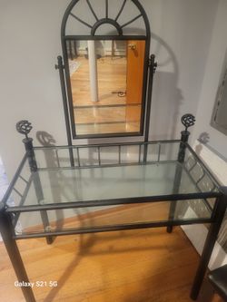 glass table with a mirror