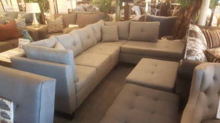 Brand new light grey linen 105" x 80" sectional + storage ottoman