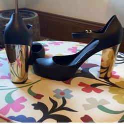 melissa black pumps with gold heels