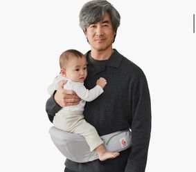 Hip seat baby carrier
