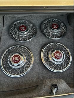 Cadillac DeVille hubcaps 14”