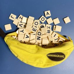Bananagrams Classic Word Game - Fast-Paced Spelling & Anagram, Family & Travel Game, 144 Letter Tiles in Portable Banana Pouch, 1-8 Players, Education