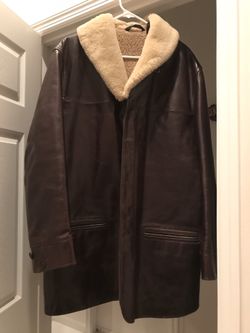 DNKY- Men’s authentic leather coat with inside fur lining.  XL Just what u need! Very good condition!