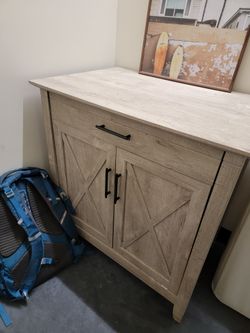 Nice rustic washed gray storage cabinet