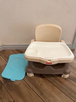 FisherPrice booster chair with double trays and tray cover