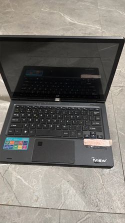 Black Laptop with Stickers