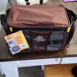 New Okeechobee fishing bag with 3 utility boxes, 2 exterior zipup pockets, a mesh pocket, 2 D rings, shoulder strap