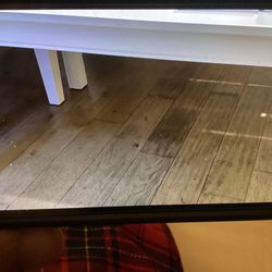2 White Table Difference Sizes 33x63 & 39x66x29” High Asking $100. Each 
