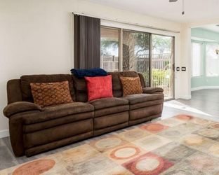Brown La-Z-Boy reclining sofa couch
