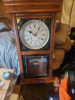 Standard time wall clock tall 40" wide 5.5"