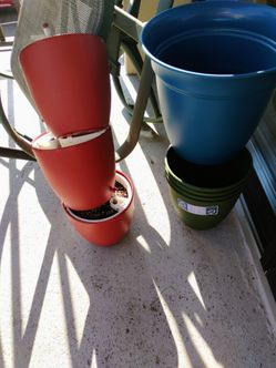 All for $25 metal rail hanging planter different sizes plastic planter 8 of them metal plant stand pickup only cash
