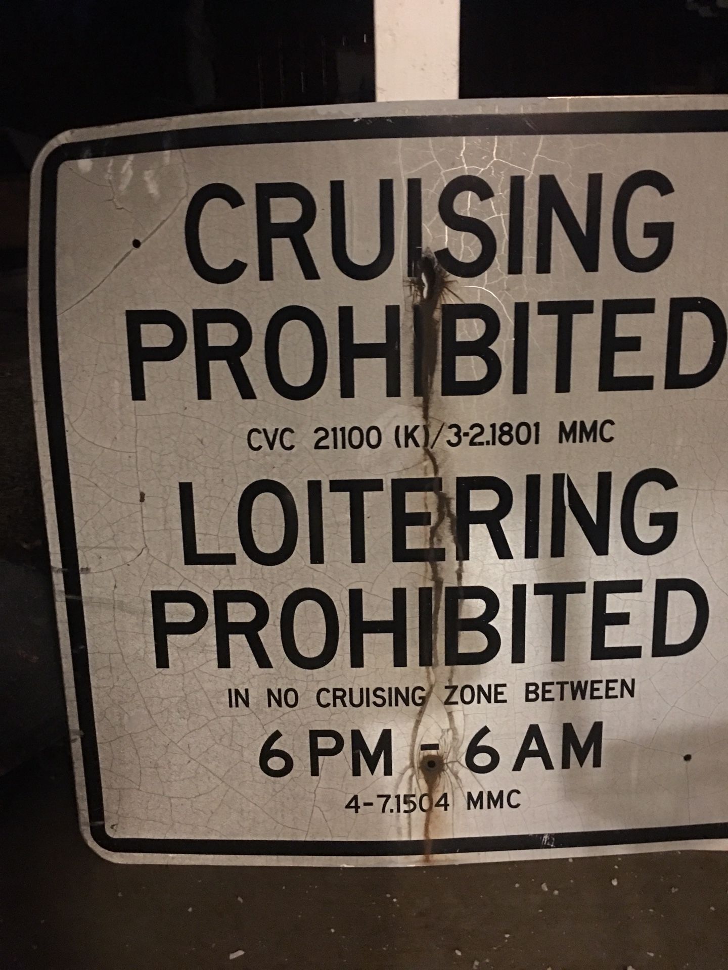 Large metal no cruising sign