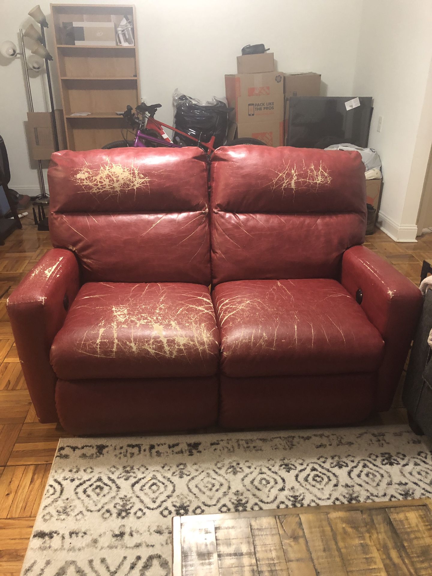 Couch -Leather Electronic Recliner
