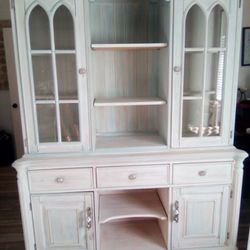 Cabinet.  Or China Hutch. 