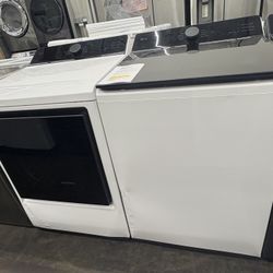LG 5.5 cu.ft. Top Load Washer & 7.3 cu.ft. Vented SMART Gas Dryer 