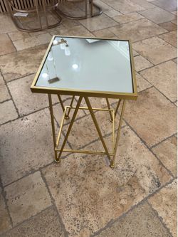 Gold and mirror table