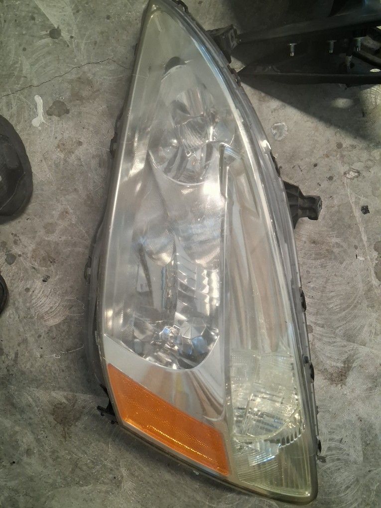 2015 nissan rogue left front headlight