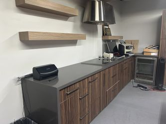 Mini Kitchen With Viking Cooktop, Hood, And Extras On The Cabinets 