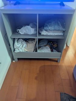 2 units of Gray Wood Storage Shelf