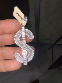 Sliver Dollar Sign covered with Cz and Baguette