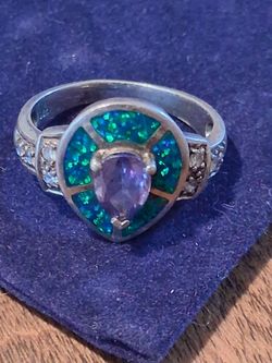 Silver ring with black opal and blue sapphire