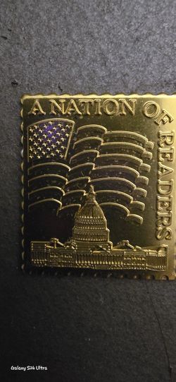 A Nation of Readers Gold Metal Stamp