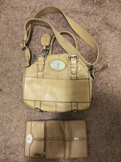 Brown Fossil purse and wallet