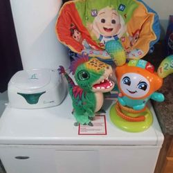 Diaper Genie, Diaper Wipes Warmer, Fisher Price Bouncing Toy & Munchkin T-Rex 