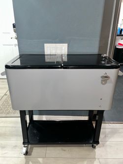 White and black cooler with cover