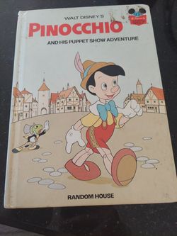 Vintage. Walt Disney's Pinocchio and his puppet show adventure.