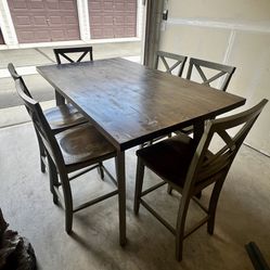Beautiful rustic farmhouse 7 piece kitchen dining table set with 6 chairs. Very good condition. Counter height. From the Fairhaven collection made by 