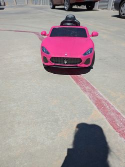 Pink electric kids car