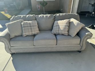 Gray sofa With 4 Pillows