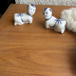 vintage-style Chinese porcelain figures, commonly known as "Pillow Babies" 