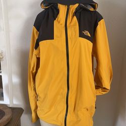 The north face men’s jacket windbreaker size large  used  has a very ligh stain is on picture 