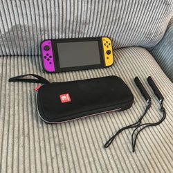 Nintendo Switch Console + Carrying Case + Grip