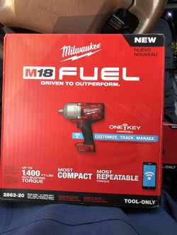 Milwaukee m18 fuel 1/2” high Torque impact wrench w/friction ring & one key