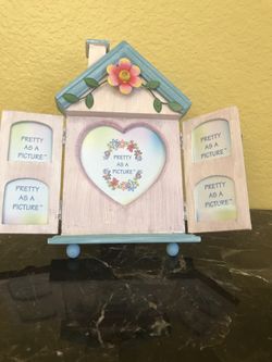 A beautiful girls picture frame 9X5 new