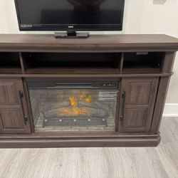 Brown TV Stand with Built-In Electric Fireplace