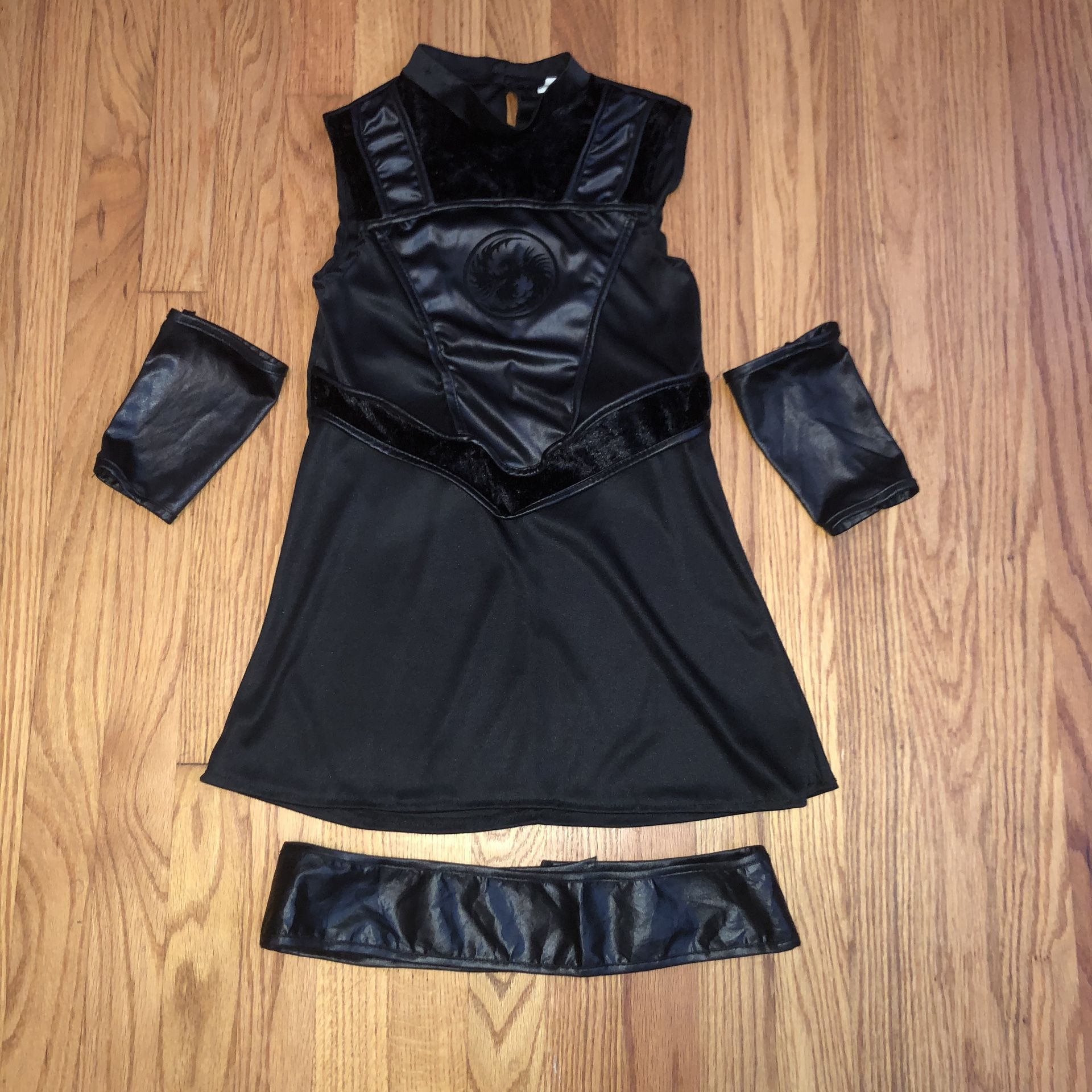 Kids all black ninja dress/costume with wrist bands and a Velcro belt. Size 8-10. Only worn once!