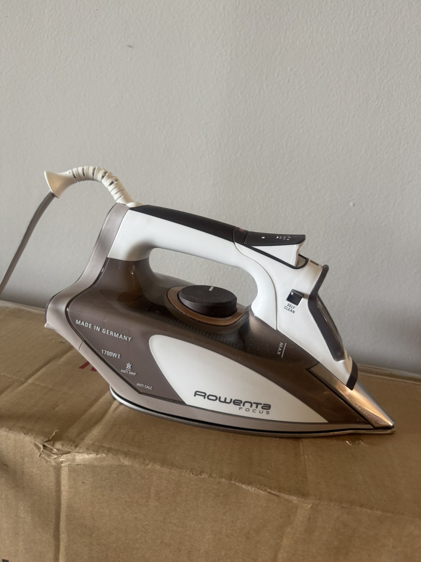 Rowenta DW5080 1700-Watt Micro Steam Iron Stainless Steel Soleplate with Auto-Off, 400-Hole, Brown