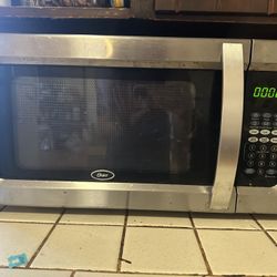 Oster 1100 Watt Countertop Microwave