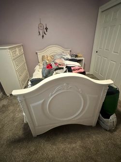 White Wood Bed Frame with Ornate Details