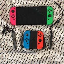 Oled Nintendo Switch With 2 Extra Joy Cons,and Controller Thing, Also Ganes