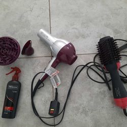 Hair Dryer And Styling With Heat Resistant Spray 