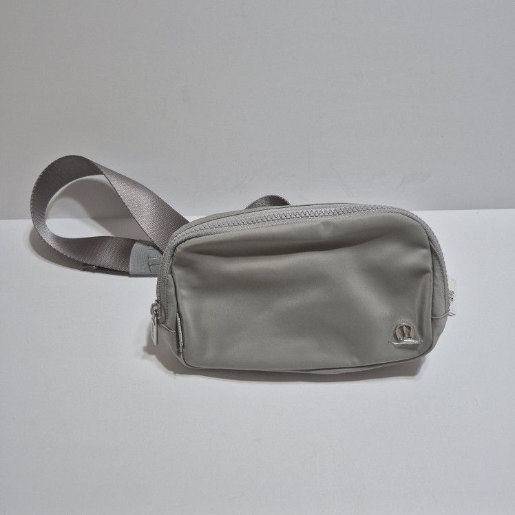 NWT Lululemon | Everywhere Belt Bag 1L Wordmark Logo Spellout Grey Gold Unisex