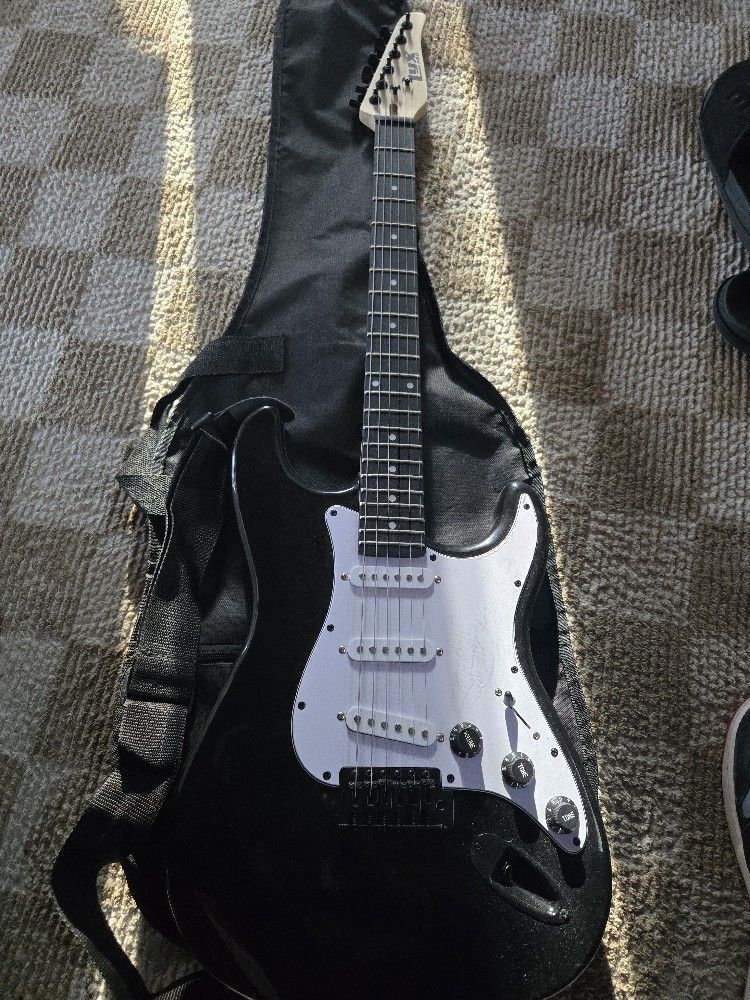 Guitar With Amp And Stand