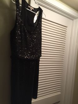 Little black dress. Short, size SP. fits up to a small medium. Cute and easy for summer evenings out