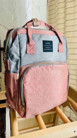 Pink/Grey Diaper Bag with Portable Bassinet/Changing Area