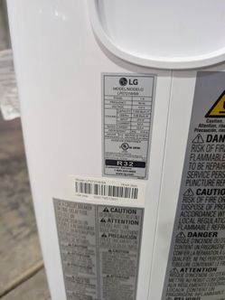 Free LG portable white AC, needs work